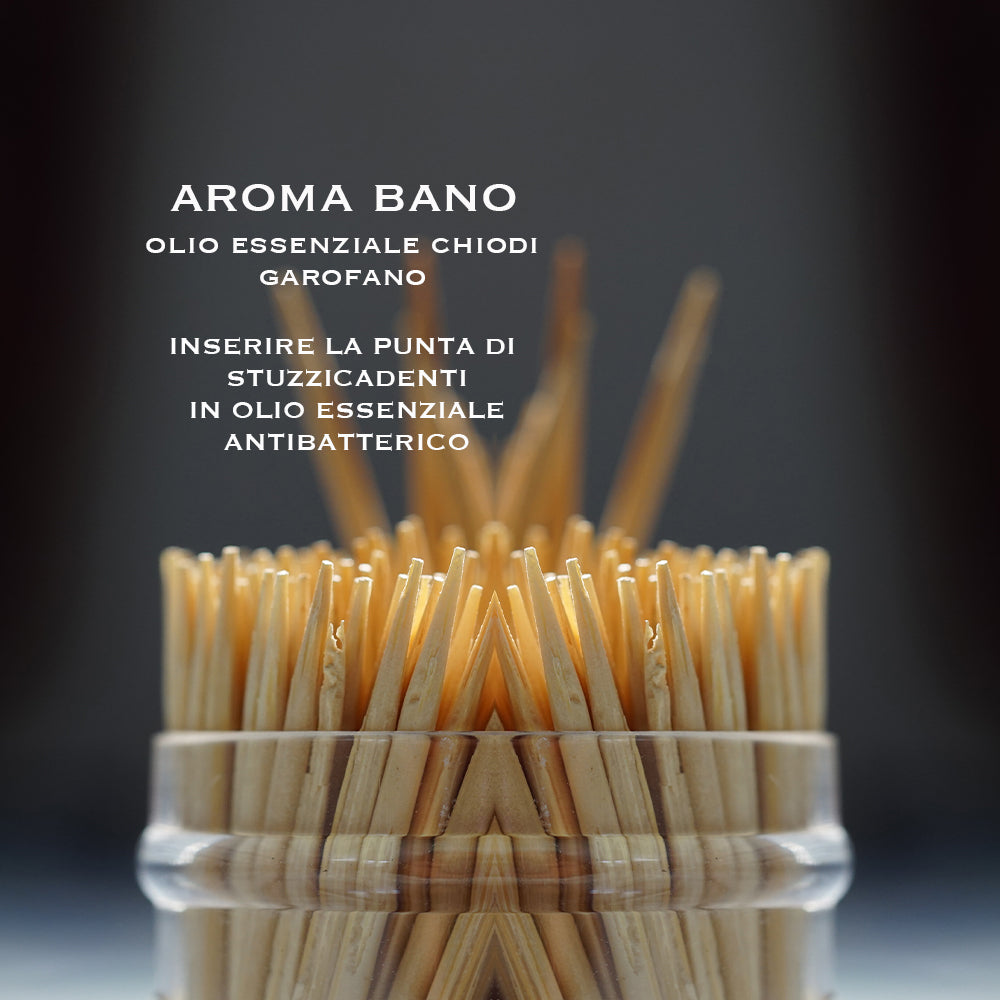 Olio essenziale di Chiodi di Garofano Aroma Bano utilizzato con stuzzicadenti per azione antibatterica naturale