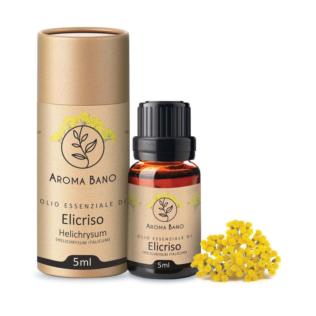 Confezione e bottiglia da 5 ml di olio essenziale di Elicriso Aroma Bano affiancate da fiori di elicriso